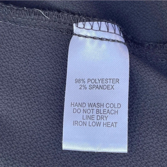 Lulus v-neck peplum black blouse top. Elastic sleeve cuffs, button at bust. - Picture 4 of 5